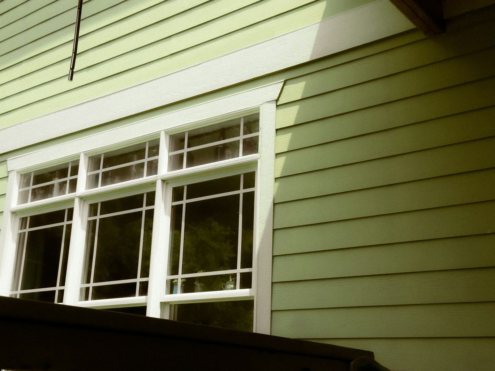 Lap siding and trimmed windows on a home exterior